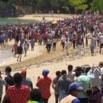 CUANTA GENTE SE REUNE EN PUERTO PLATA. PELEGRINO. CURA CORONA VIRUS